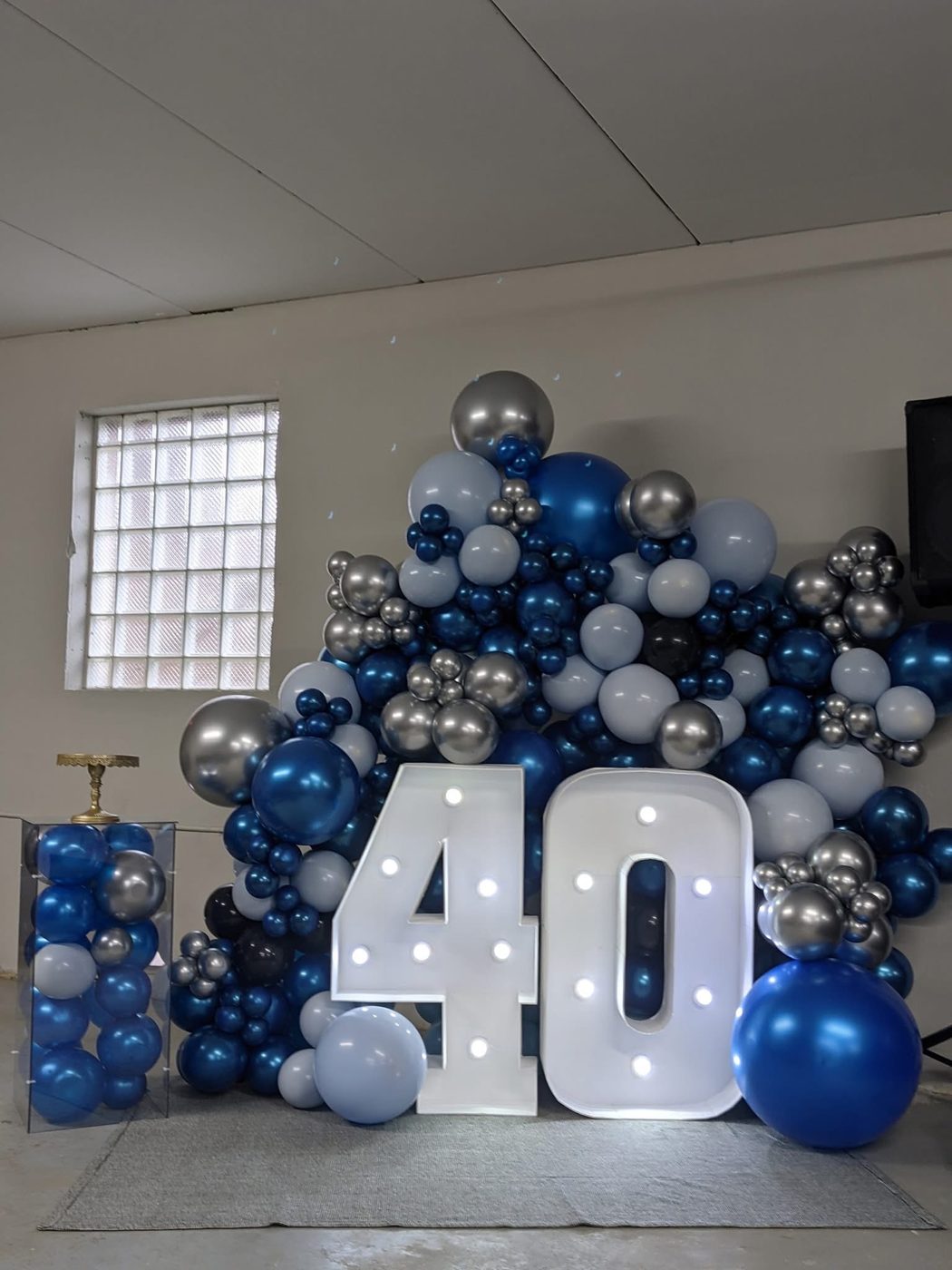 Navy and silver balloon garland with large light-up number 40