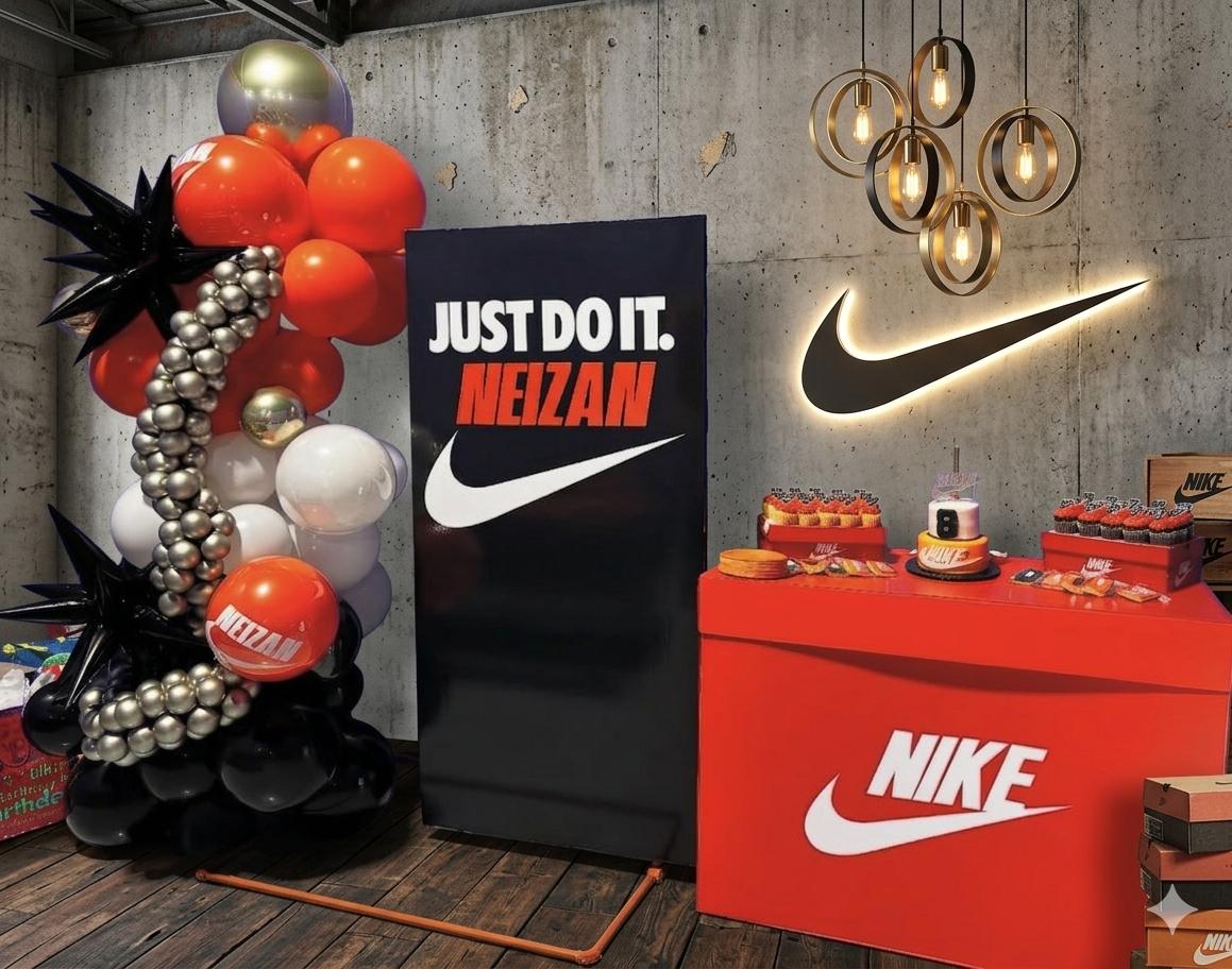 Red, black and silver Nike themed balloon display